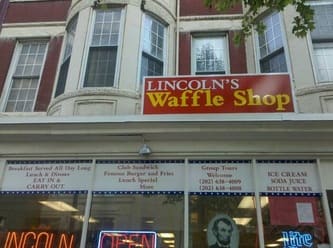 The red and gold Lincoln's Waffle Shop storefront sign on 10th Street NW