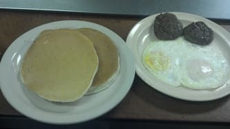 A classic breakfast plate at the counter